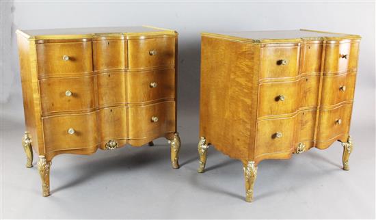 A pair of serpentine maple wood commodes, by Hille, London, W.3ft 1in. D.1ft 11in. H.3ft 2in.